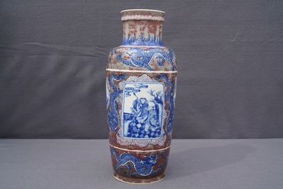 A rare Chinese blue, white and underglaze red rouleau vase, Kangxi